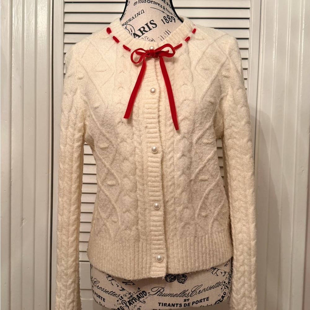 Elegant Cream Sweater with Red Bow